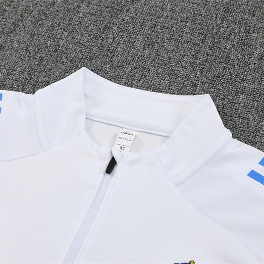 25/26 Real Madrid Training White/Light Blue Tracksuit from FootballPrestige.shop - Premium Concept kits