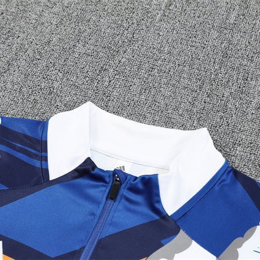 Real Madrid "Azul Reactor" Premium Kids Size Tracksuit from FootballPrestige.shop - Premium Concept kits