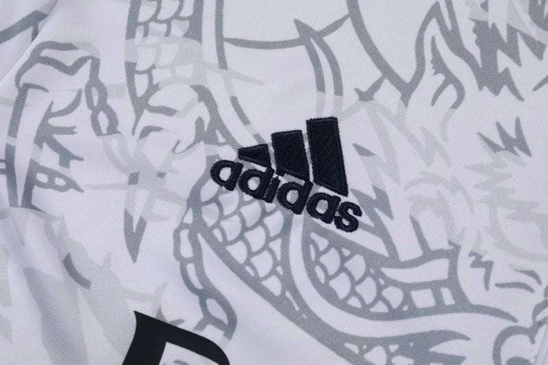 Real Madrid "Dragón Blanco" Premium Tracksuit from FootballPrestige.shop - Premium Concept kits