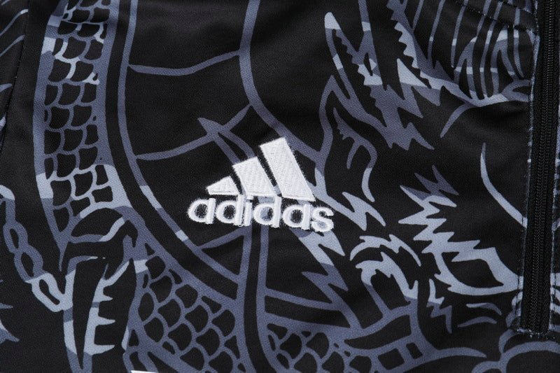 Real Madrid "Dragón Negro" Premium Tracksuit from FootballPrestige.shop - Premium Concept kits