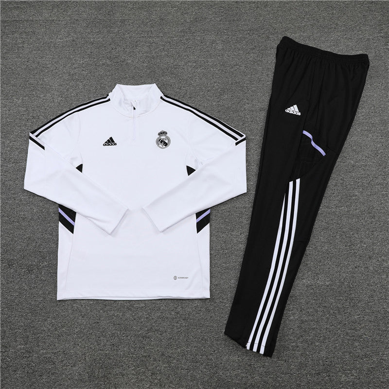 Real Madrid "Momentum" Premium Tracksuit from FootballPrestige.shop - Premium Concept kits