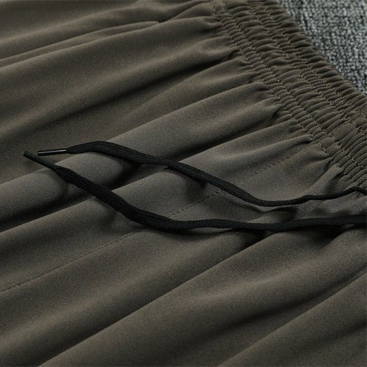 25/26 Real Madrid Training Dark Olive Tracksuit from FootballPrestige.shop - Premium Concept kits