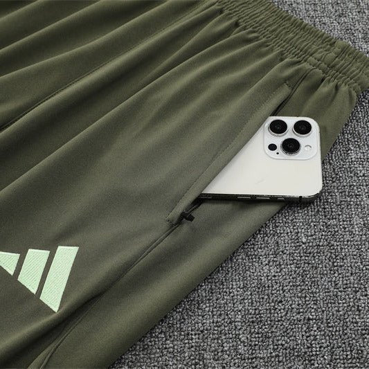25/26 Real Madrid Training Dark Olive Tracksuit from FootballPrestige.shop - Premium Concept kits