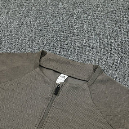 25/26 Real Madrid Training Dark Olive Tracksuit - Premium Quality Jersey at FootballPrestige.com