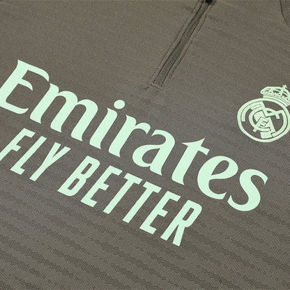 25/26 Real Madrid Training Dark Olive Tracksuit - Premium Quality Jersey at FootballPrestige.com