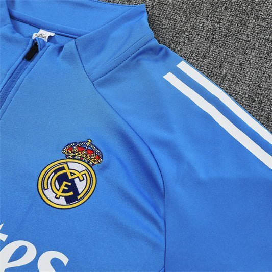 25/26 Real Madrid Training Light Blue Kids Size Tracksuit from FootballPrestige.shop - Premium Concept kits