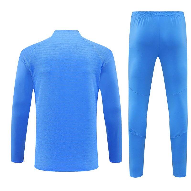 25/26 Real Madrid Training Light Blue Kids Size Tracksuit from FootballPrestige.shop - Premium Concept kits