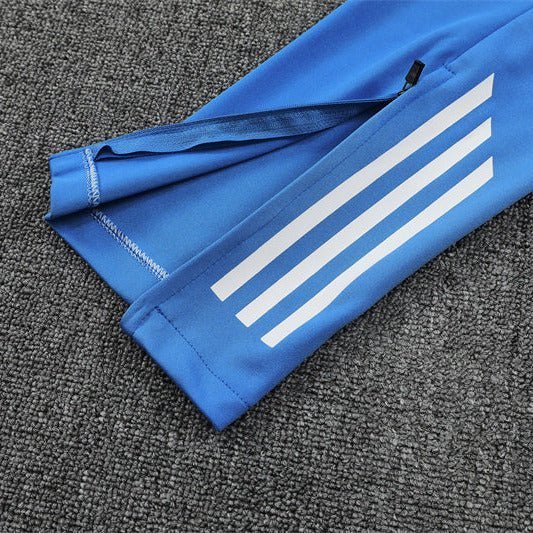 25/26 Real Madrid Training Light Blue Tracksuit from FootballPrestige.shop - Premium Concept kits