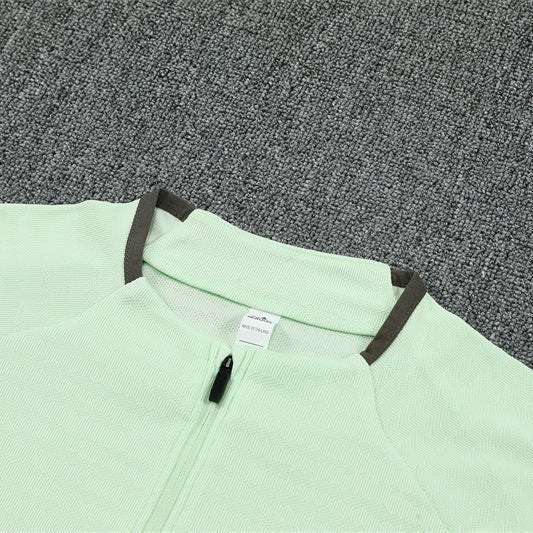 25/26 Real Madrid Training Lime Green Tracksuit from FootballPrestige.shop - Premium Concept kits