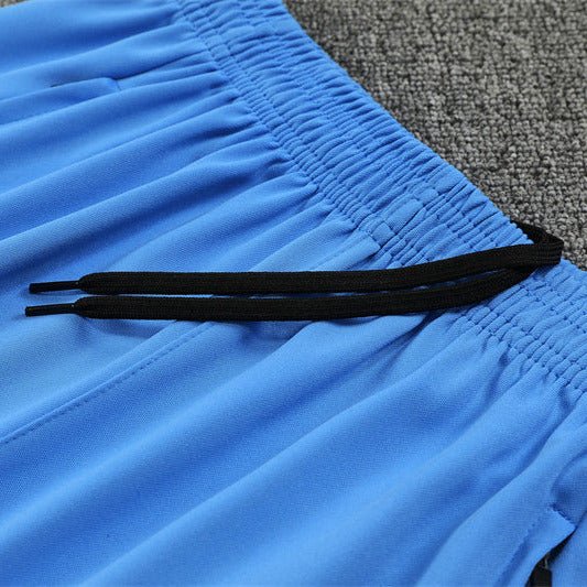 25/26 Real Madrid Training White/Light Blue Kids Size Tracksuit - Premium Quality Jersey at FootballPrestige.com