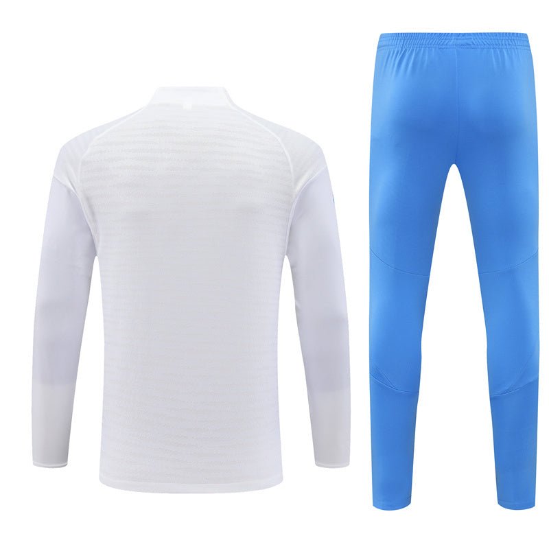 25/26 Real Madrid Training White/Light Blue Tracksuit from FootballPrestige.shop - Premium Concept kits