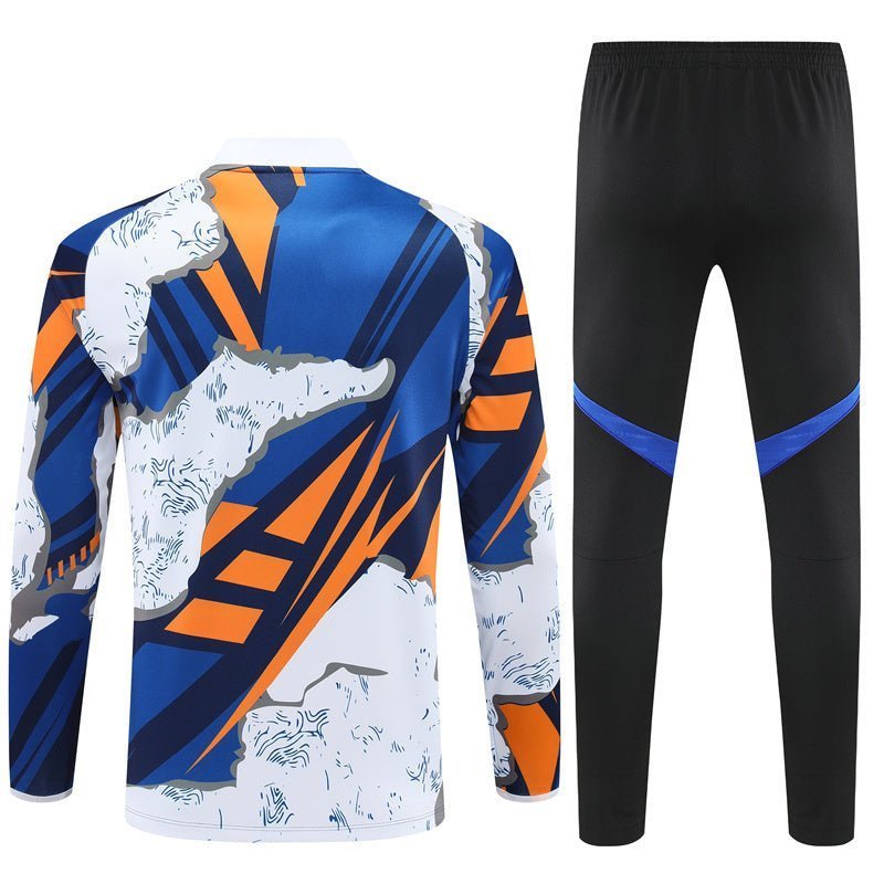 Real Madrid "Azul Reactor" Premium Kids Size Tracksuit from FootballPrestige.shop - Premium Concept kits