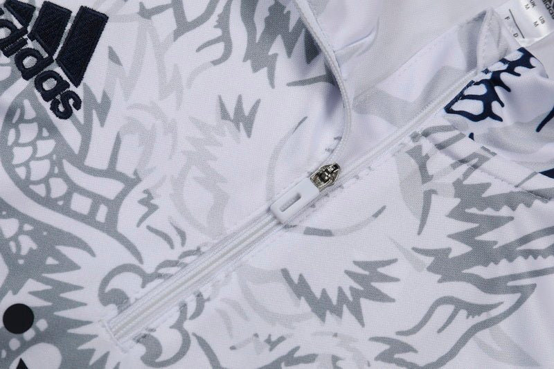 Real Madrid "Dragón Blanco" Premium Tracksuit from FootballPrestige.shop - Premium Concept kits