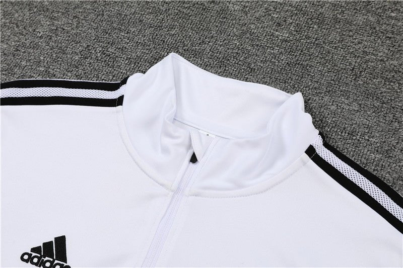 Real Madrid "Momentum" Premium Tracksuit from FootballPrestige.shop - Premium Concept kits