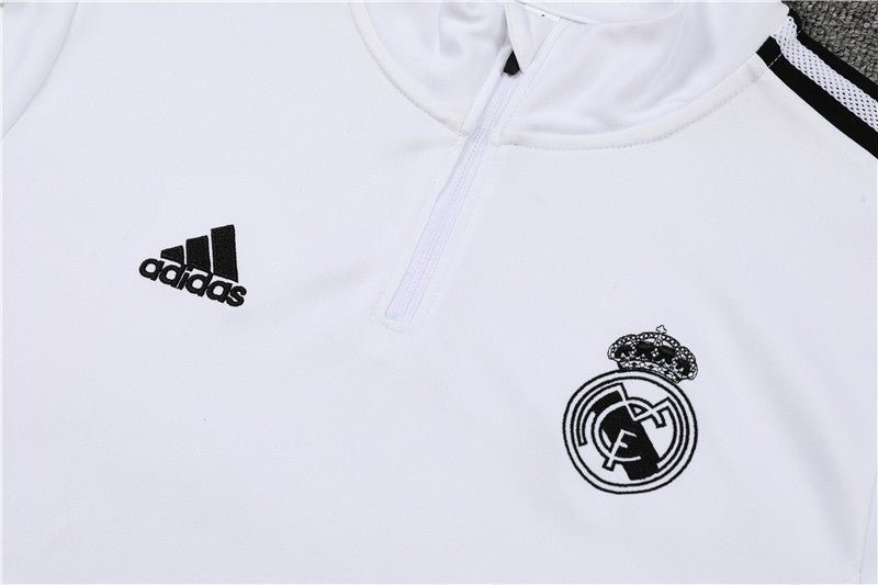 Real Madrid "Momentum" Premium Tracksuit from FootballPrestige.shop - Premium Concept kits