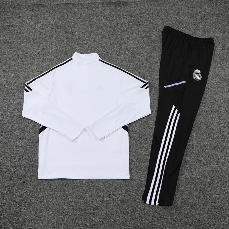 Real Madrid "Momentum" Premium Tracksuit from FootballPrestige.shop - Premium Concept kits