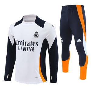 Real Madrid "Supercharged" Premium Kids Size Tracksuit from FootballPrestige.shop - Premium Concept kits